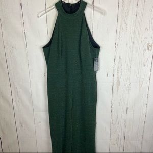 a jumpsuit: DONNA MORGAN green metallic jumpsuit